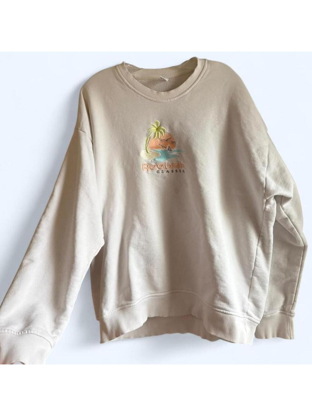 Reebok cream sweatshirt with palm tree design
